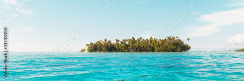 Beach paradise travel vacation view of tropical motu island idyllic crystalline turquoise ocean in Rangiroa atoll, Tuamotu islands, French Polynesia. Tahiti honeymoon destination panoramic banner. photo