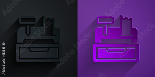 Paper cut Cash register machine with a check icon isolated on black on purple background. Cashier sign. Cashbox symbol. Paper art style. Vector