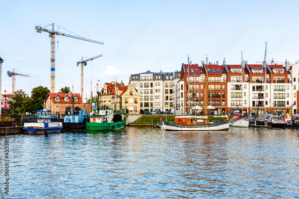 new apartment buildings build in a harbour in an urban environment