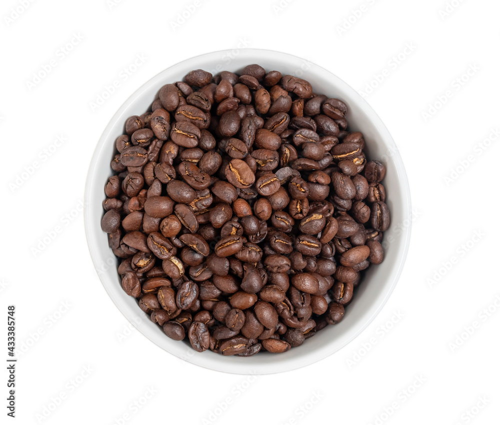 Roasted coffee beans in white bowl on stainless steel top table, isolation on white background, selective focus