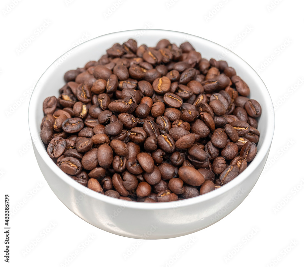 Roasted coffee beans in white bowl on stainless steel top table, isolation on white background, selective focus Roasted coffee beans in white bowl on stainless steel top table, isolation on white background, selective focus
