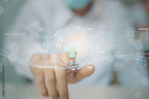 Blurred-businessman hand holding modern medical sign interface,with medical network health care online connection,concept business and medicine with profit,benefit,health and insurance for patients photo