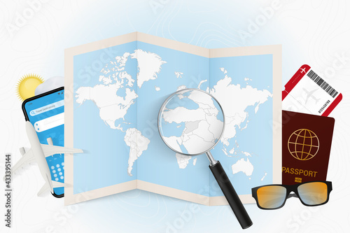 Travel destination Syria, tourism mockup with travel equipment and world map with magnifying glass on a Syria.