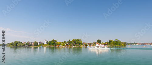 Island Fraueninsel on Lake Chiemsee on a sunny summer day with ferry