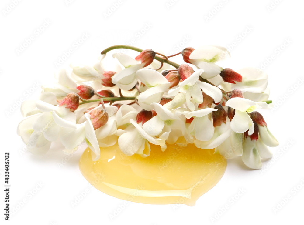 Acacia flowers with honey isolated on white background Acacia flowers with honey isolated on white background