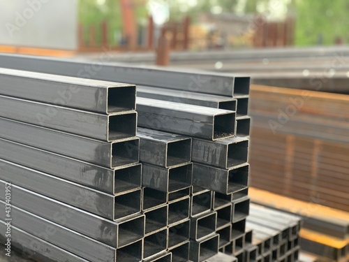 Rectangular steel pipes. Steel profile rectangular pipe at the warehouse of metal products.
