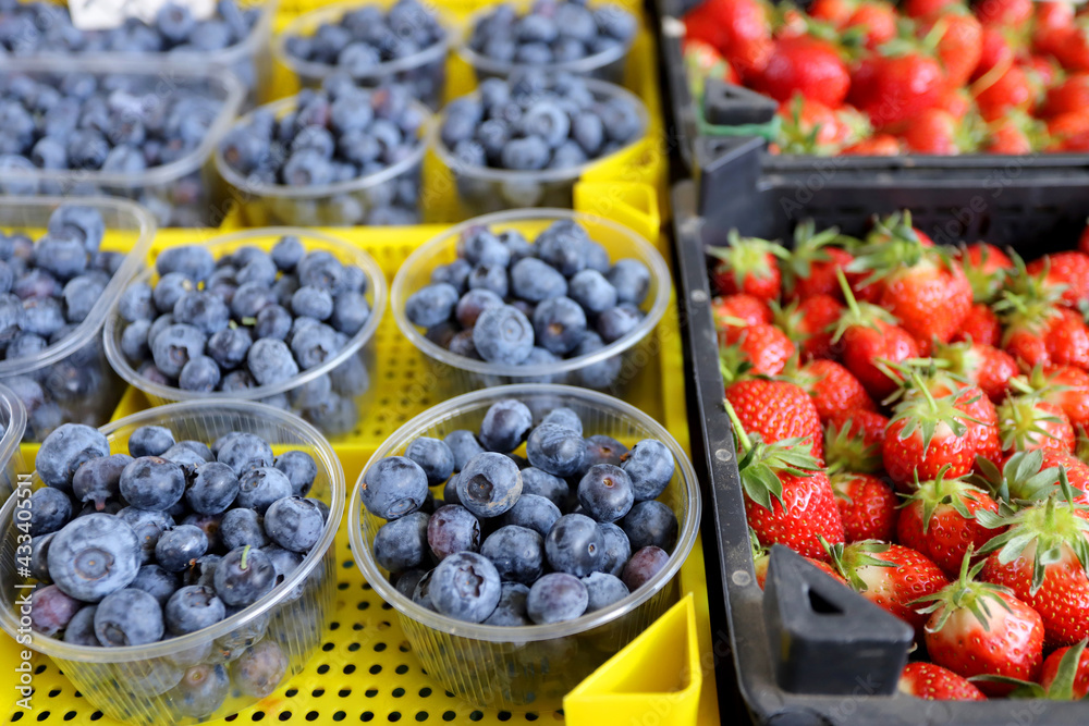 Blueberries and strawberries at farmer market Blueberries and strawberries at farmer market