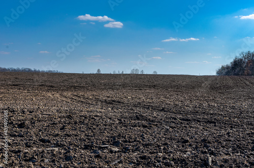 plowed soil field in spring