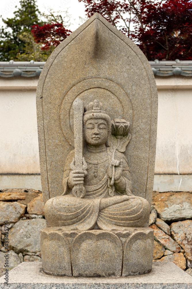 Obraz premium Stone statue of Manjushri at Taifuku-ji temple in Kobe, Hyogo, Japan