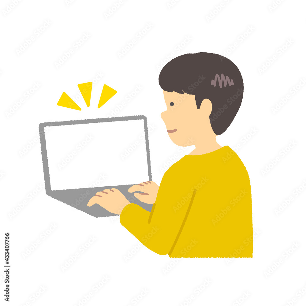 Boy in yellow clothes using a computer