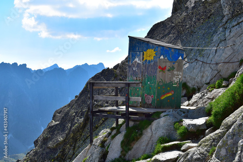 Fototapeta Naklejka Na Ścianę i Meble -  Probably the most famous outdoor toilet in the world - the toilet of the mountain lodge Chata pod Rysmi near mount Rysy, Slovakia and Poland.