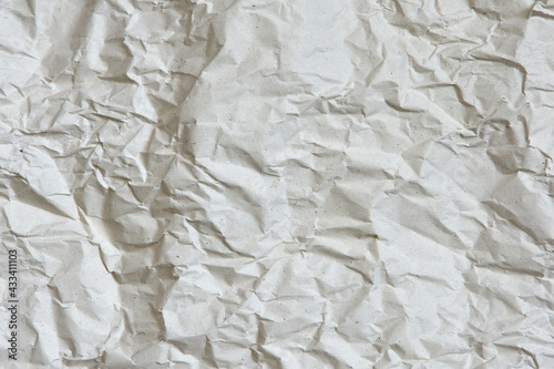beige crumpled craft paper. recyclable background