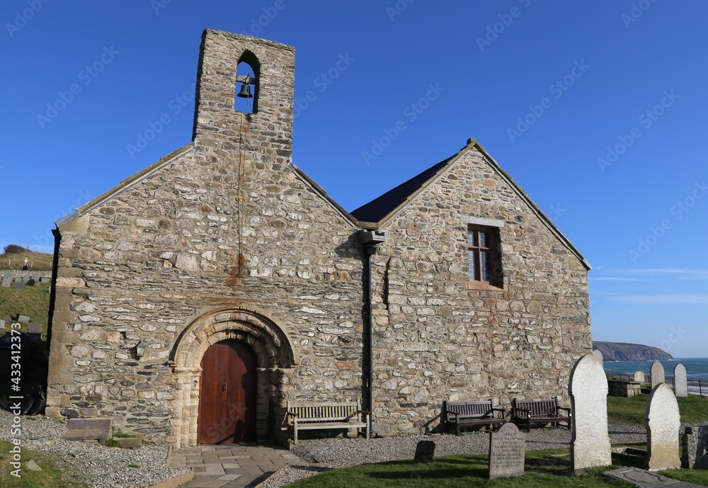 St Hywyn's, an ancient church with a Norman doorway at Aberdaron, Llyn Peninsula, Gwynedd, Wales, UK.