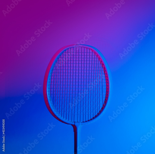 Badminton racket in vibrant bold gradient holographic neon colors © Augustas Cetkauskas