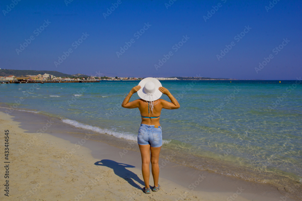 beautiful young woman in bikini on the beach beautiful young woman in bikini on the beach