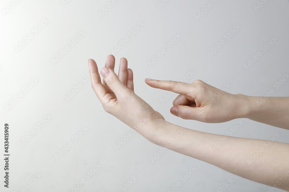 Woman hand gesture holding and touching smartphone