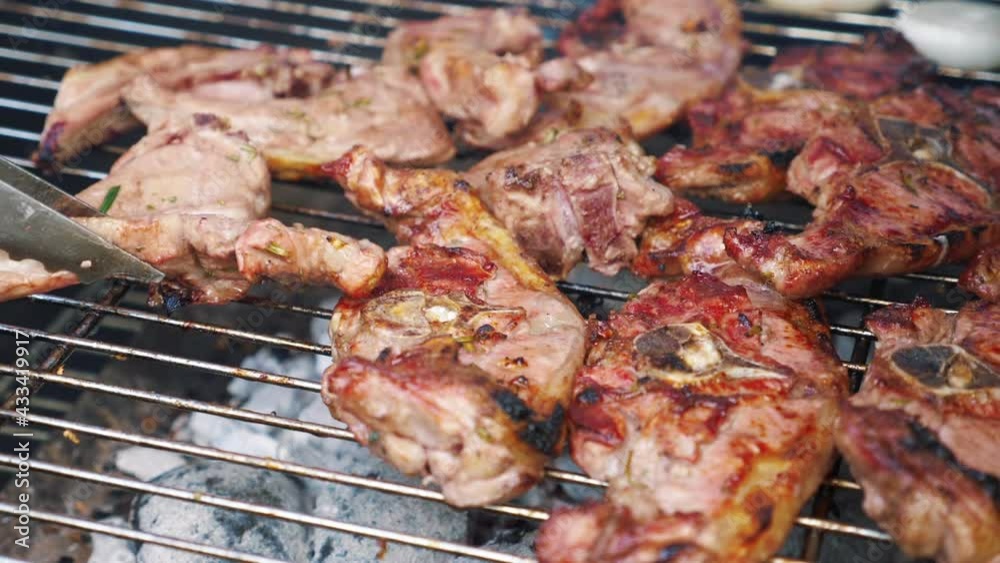 Roasted delicious meat on the grill in slow motion 180fps Roasted delicious meat on the grill in slow motion 180fps