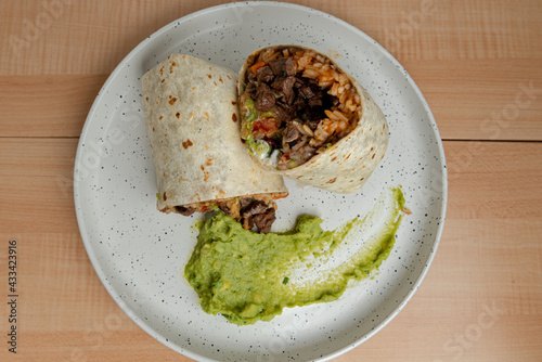Classic Mexican Burrito dish on white plate