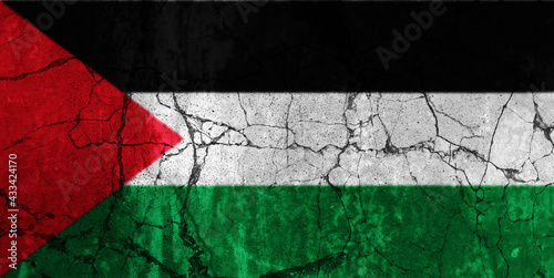 Foto Digital Composite - Cracked and damaged flag of Palestine.