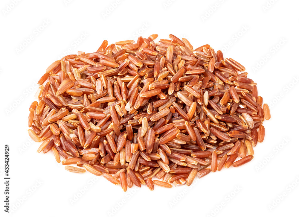 handful of raw red rice closeup on white handful of raw red rice closeup on white