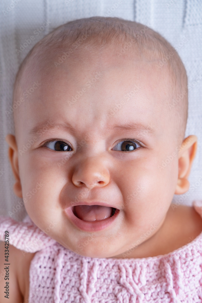 Close-up portrait of a screaming newborn Close-up portrait of a screaming newborn
