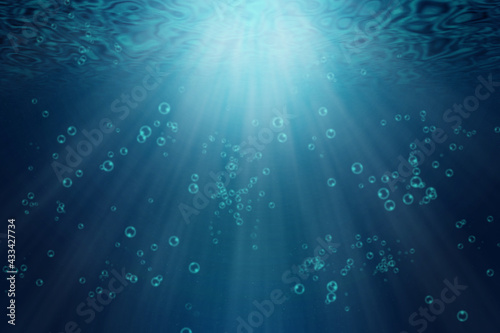 Blue underwater world of sea or ocean with rays background. Illustration of ecology concept.