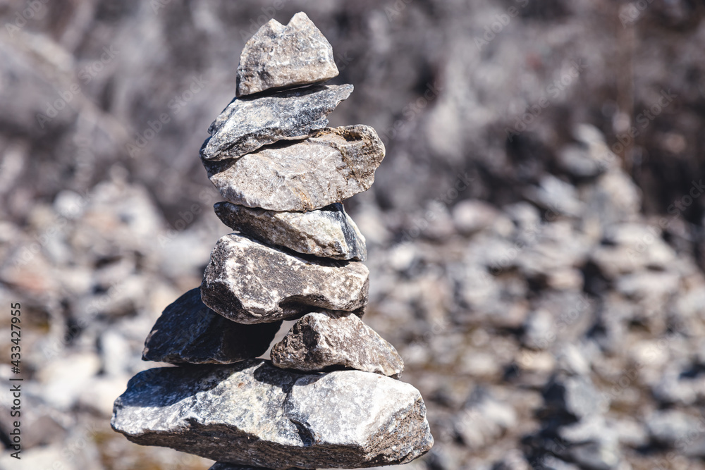 cairn on a rock on a sunny day cairn on a rock on a sunny day