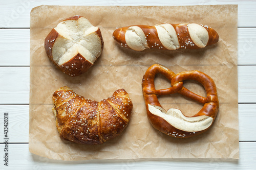 lye pastry, pretzel, roll, bar, croissant, top view photo