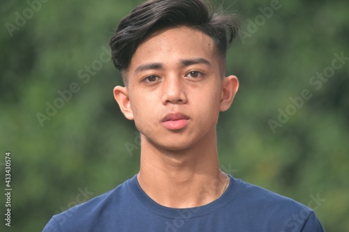 Handsome Serious Young Filipino Teen Boy