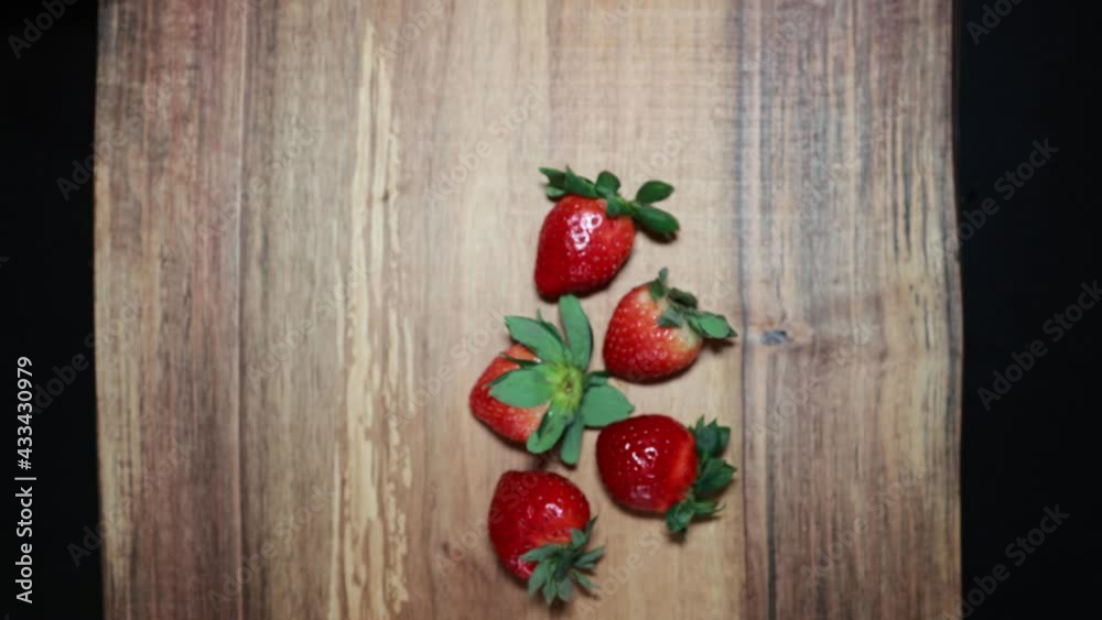 making chocolate-covered strawberries making chocolate-covered strawberries