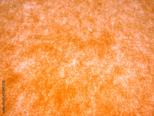 まだら模様の水彩オレンジ・茶系背景素材 和紙の接写