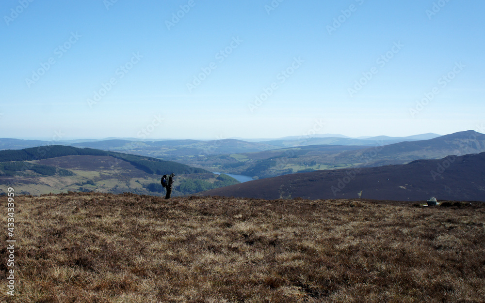 Lone hiker in the Wicklow Mountains, Ireland.