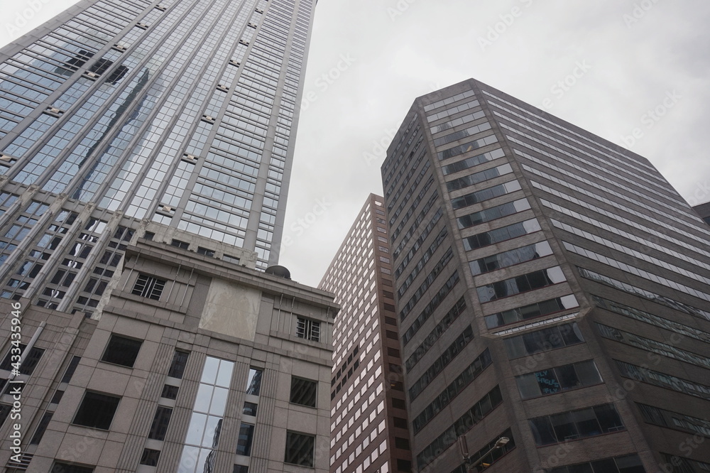 Steel Glass and Brick Towers Against the Sky 