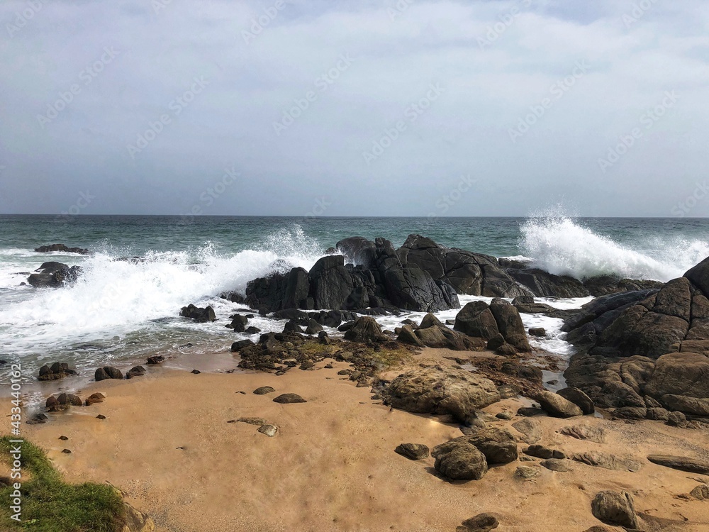 waves crashing on rocks waves crashing on rocks