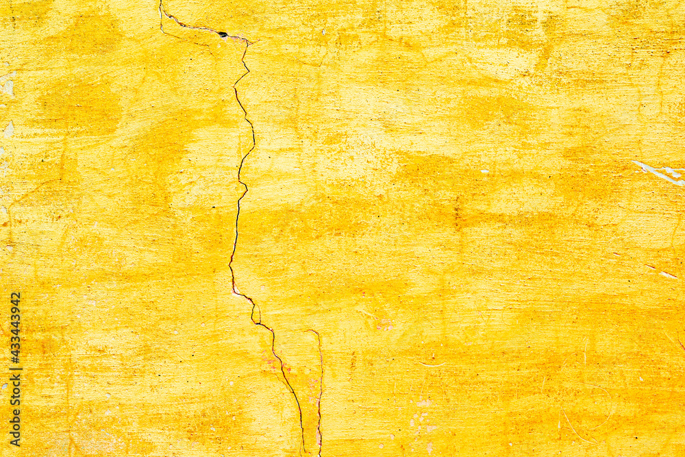 Naklejka premium Texture of a concrete wall with cracks and scratches which can be used as a background
