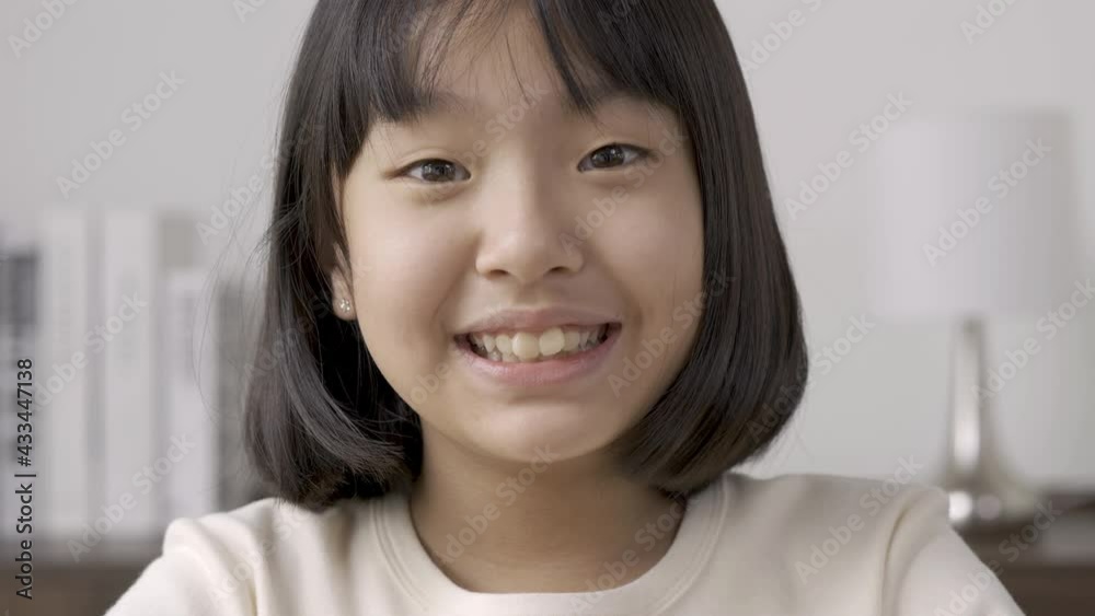 Portrait of little girl looking to camera with attractive smiling. Portrait of little girl looking to camera with attractive smiling.