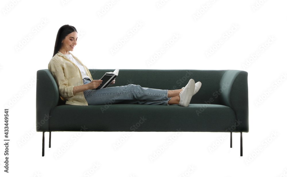 Young woman reading book on comfortable green sofa against white background Young woman reading book on comfortable green sofa against white background