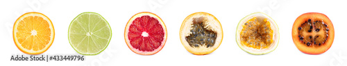 Set with different delicious cut exotic fruits on white background. Banner design
