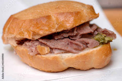 Lampredotto is the typical street food of the city of Florence in Tuscany and is a sandwich with a cow's stomach in a tomato sauce and put to stew