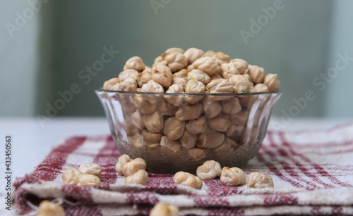 a glass bowl filled with chickpeas pulses 