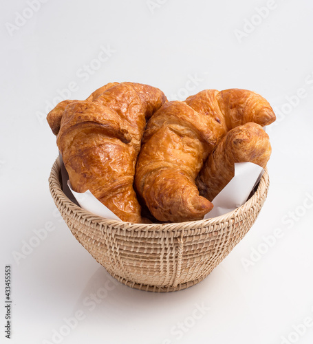 3 croissants on a basket