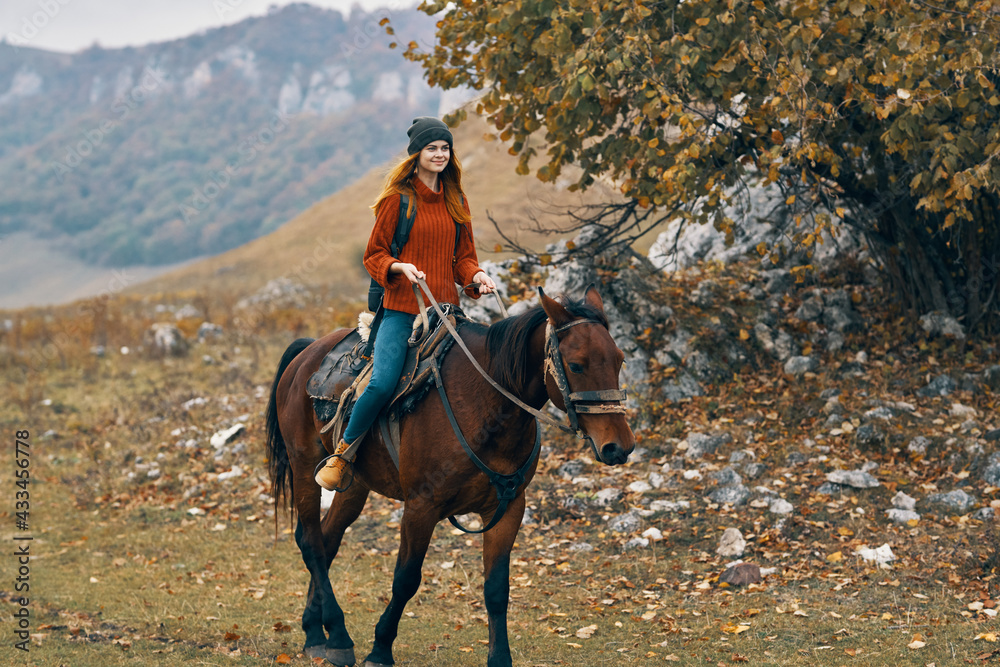 woman hiker riding horse mountains landscape travel adventure woman hiker riding horse mountains landscape travel adventure