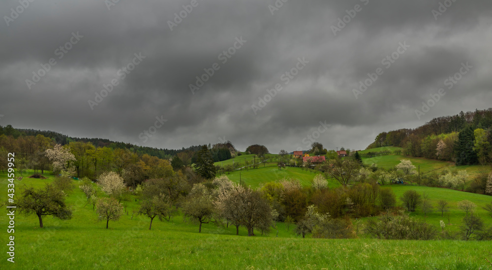 Meadows and forests near Vizovice town after big rain with cloudy sky