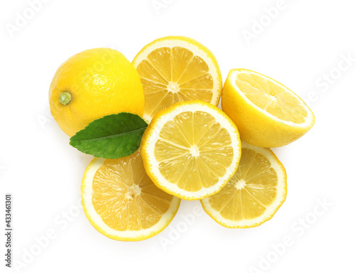 Fresh cut lemons with leaf on white background, top view