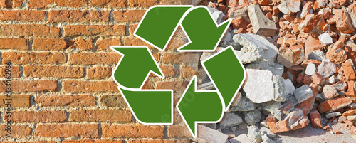 Foto Recovery and recycling of concrete and brick rubble debris on construction site