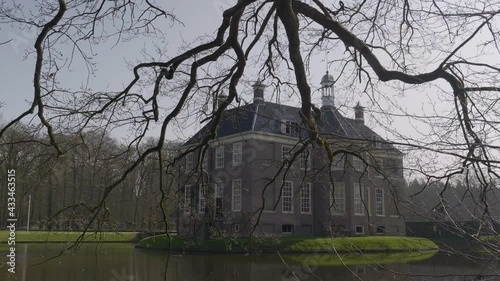 Den Berg manor house on water, historical architecture of Netherlands photo