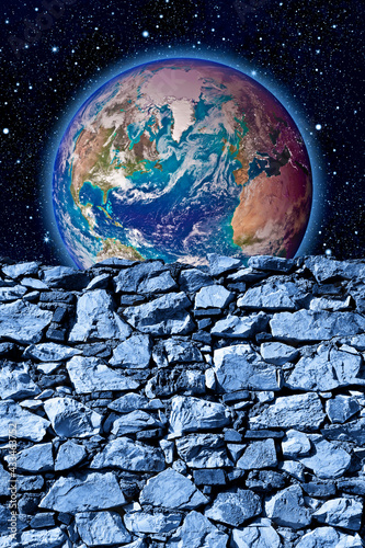 Fototapeta Naklejka Na Ścianę i Meble -  Behind a stone wall you can see the world - freedom concept image.