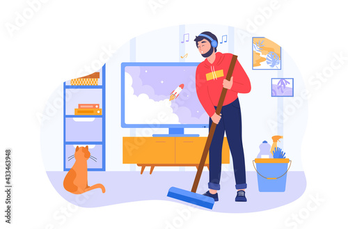 Man sweeping floor in living room.
