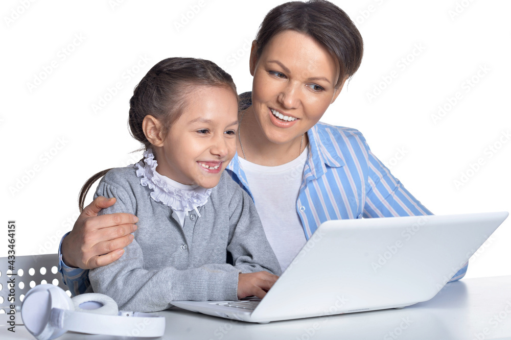 Emotional mother and daughter using laptop Emotional mother and daughter using laptop