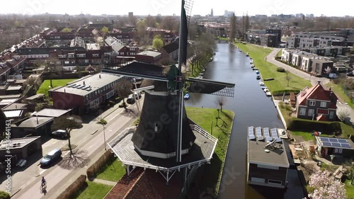 Passiebloem windmill on water canal in Zwolle, Netherlands, aerial view photo